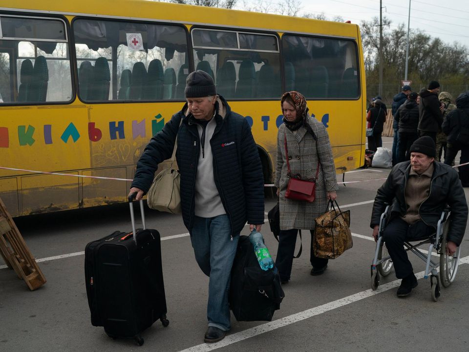Ukrainians arrive in Zaporizhzhia, Ukraine after fleeing Mariupol. Photo:AP Photo/Leo Correa