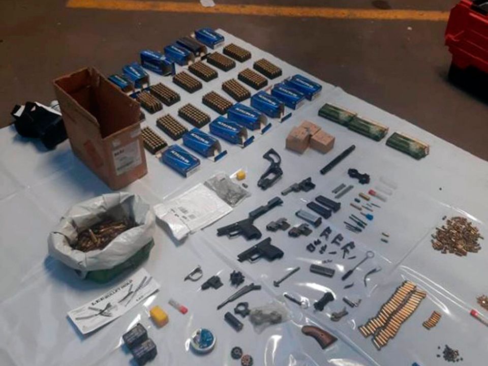 Undated handout photo issued by the National Crime Agency (NCA) of guns, ammunition and firearms seized by the NCA's Armed Operations Unit at an industrial unit linked to Evan Girdlestone,  in the Lombard Road area of Merton, south west London. Girdlestone, 47, from Colliers Wood, will appear before magistrates in Croydon, charged with offences under the Firearms Act after he was arrested in Croydon on Thursday morning. Issue date: Saturday May 20, 2023. PA Photo. See PA story COURTS Guns. Photo credit should read: National Crime Agency/PA Wire 

NOTE TO EDITORS: This handout photo may only be used in for editorial reporting purposes for the contemporaneous illustration of events, things or the people in the image or facts mentioned in the caption. Reuse of the picture may require further permission from the copyright holder. 