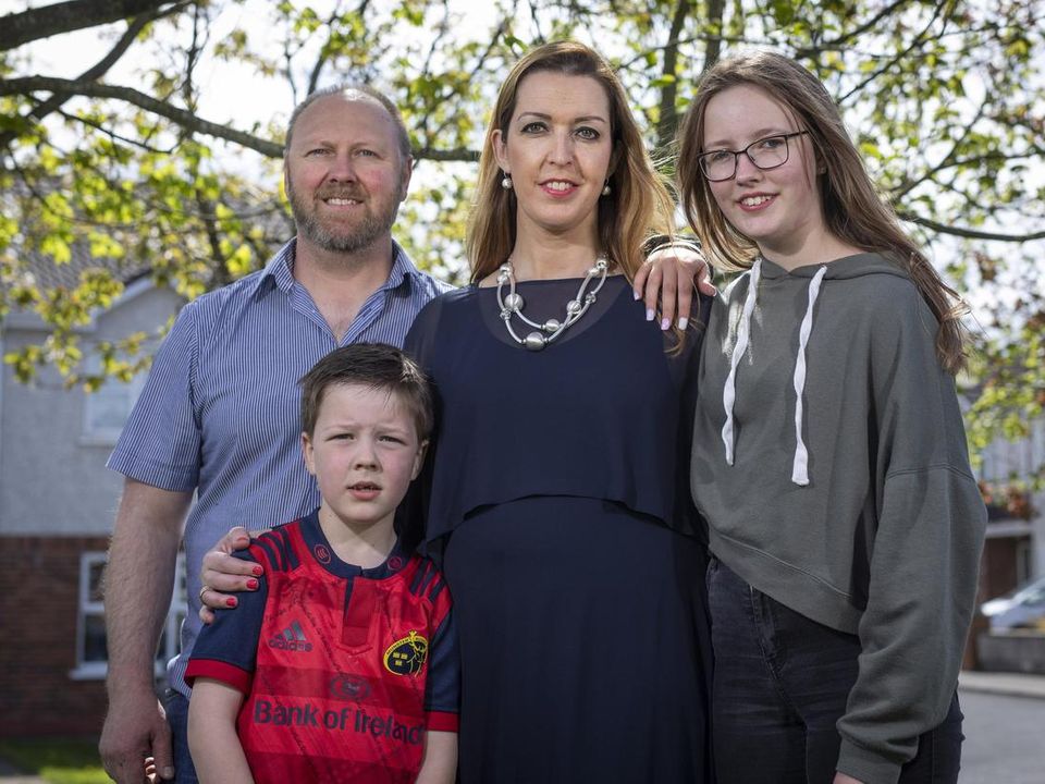 Vicky Phelan with husband Jim, and children Amelia and Darragh.