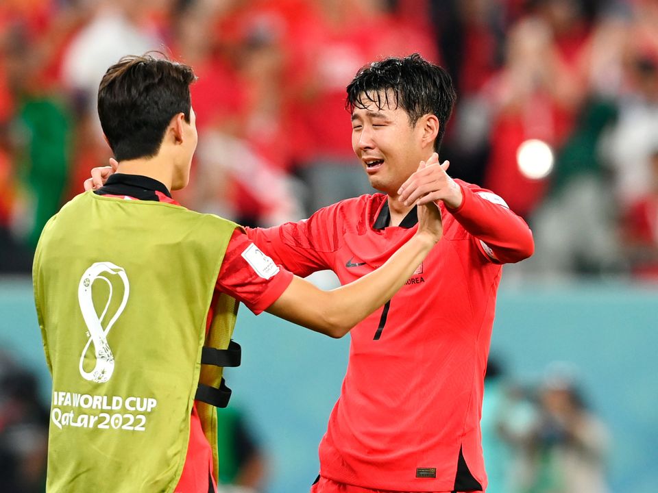 An emotional Son Heung-min celebrates as South Korea's qualification for the last 16 is confirmed