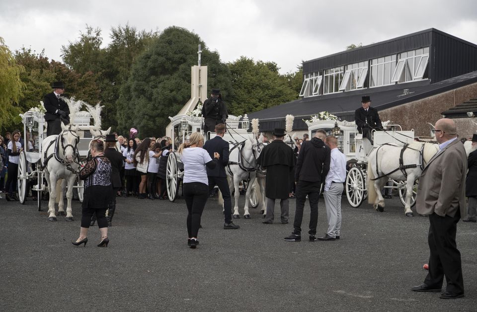 Mourners pictured at St. Aidan's Church, Brookfield Tallaght at the funeral of Lisa Cash and twin siblings Chelsea and Christy Cawley. Photo: Colin Keegan, Collins Dublin