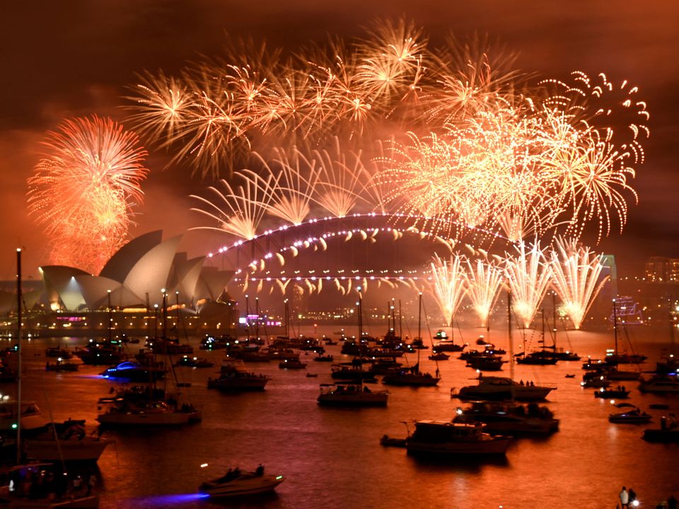 Fireworks explode over Sydney Harbour for New Year. Photo: Reuters / Jaimi Joy