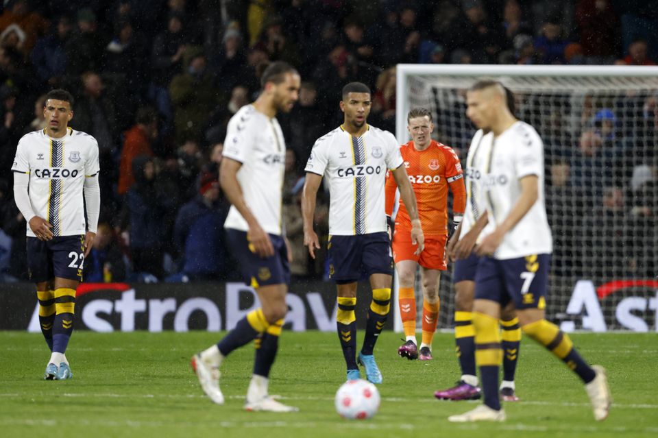 Everton players look dejected after conceding a third goal (Richard Sellers/PA)