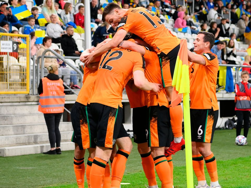 Nathan Collins celebrates scoring their side's first goal with teammates during the UEFA Nations League League B Group 1 match between Ukraine and Republic of Ireland at LKS Stadium on June 14, 2022 in Lodz, Poland. (Photo by Adam Nurkiewicz/Getty Images)