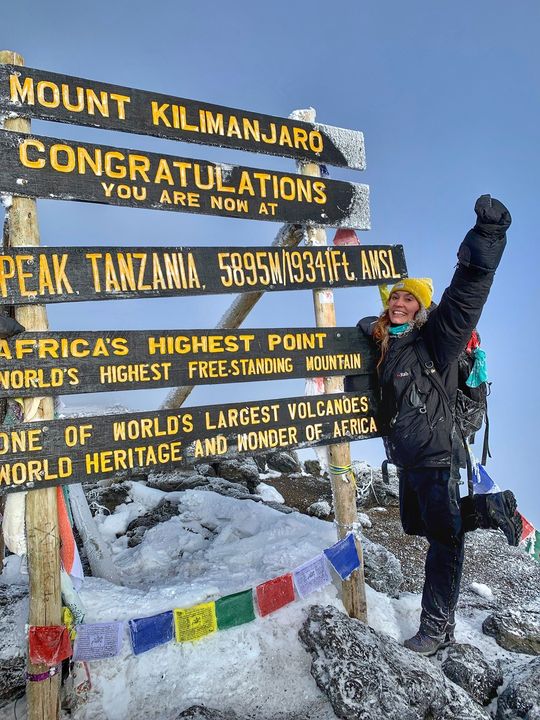 Eleanor McAree at the top of Mount Kilimanjaro