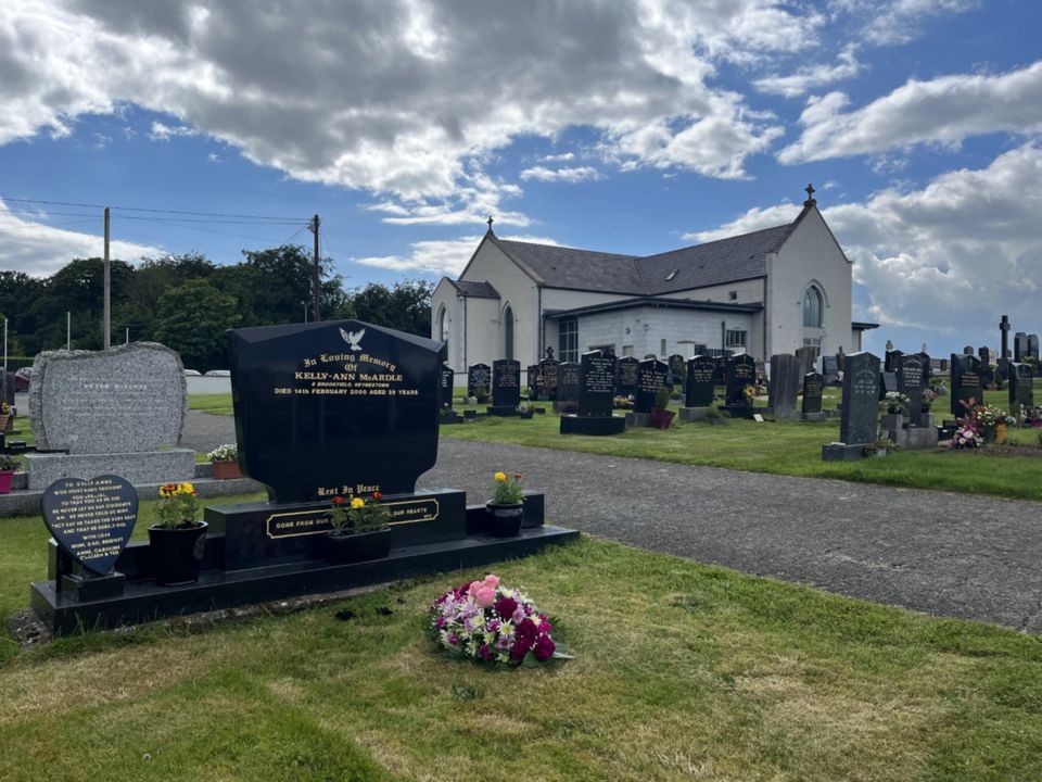 Kelly-Ann is laid to rest beside the wedding church