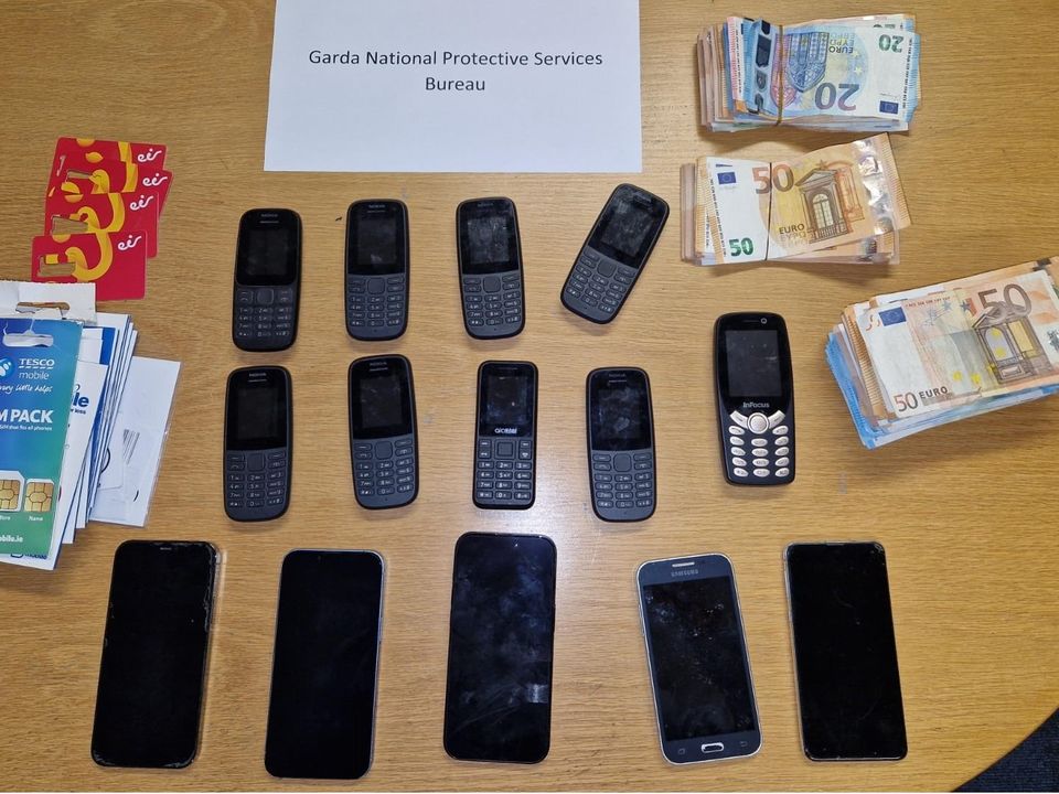 Phones and cash seized by An Garda Siochana