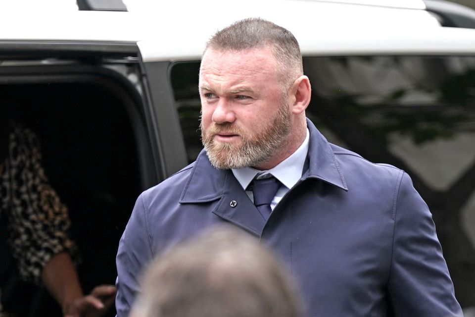 Former England star Wayne Rooney arrives at the Royal Courts of Justice to support his wife (Aaron Chown/PA)