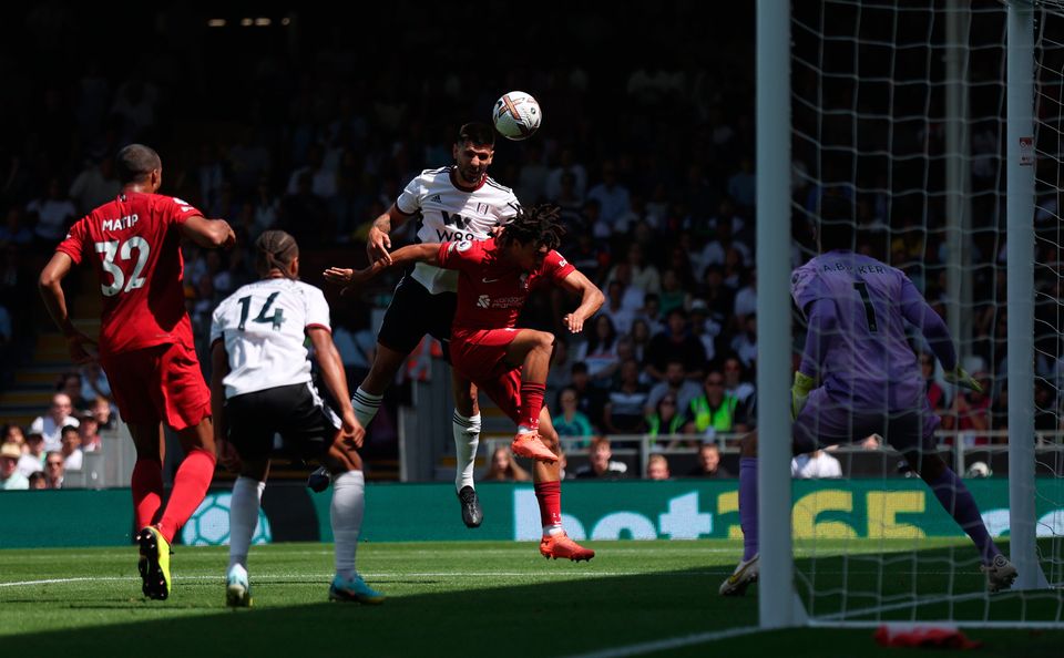 Aleksandar Mitrovic of Fulham gets above Trent Alexander-Arnold to score at Craven Cottage. Photo: Julian Finney/Getty Images