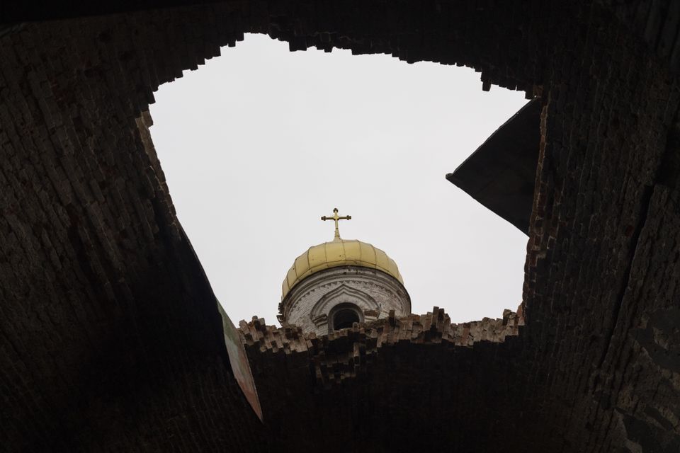 A hole in the roof of a damaged church, in Lukashivka, near the city of Chernihiv (AP)
