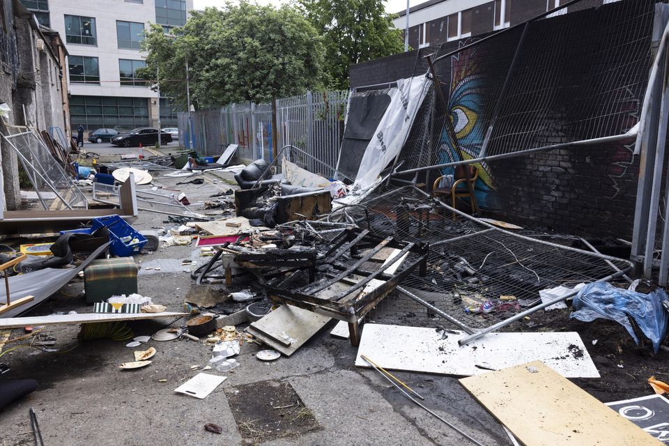 The aftermath of the arson attack on the Sandwith Street camp