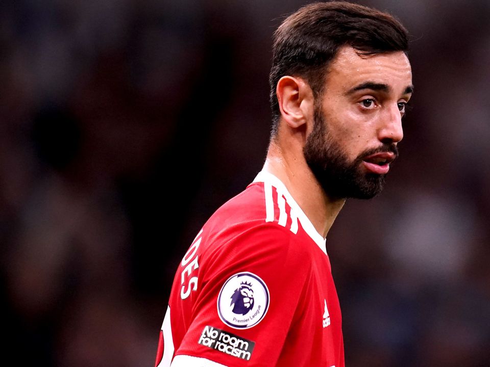 Bruno Fernandes has signed a new contract with Manchester United (John Walton/PA)