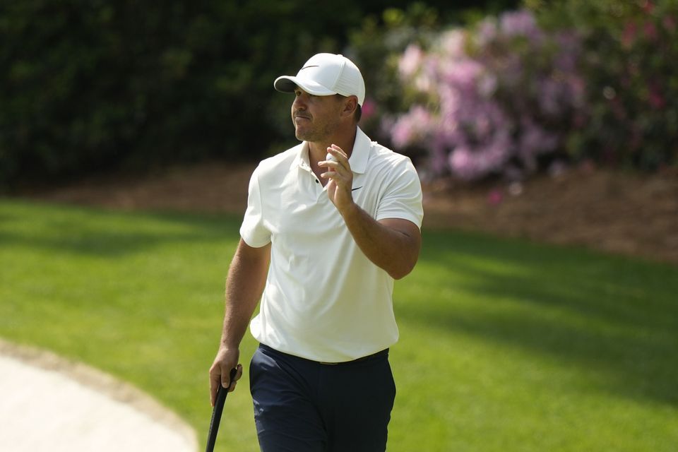 Brooks Koepka leads the way at Augusta National (Charlie Riedel/AP)