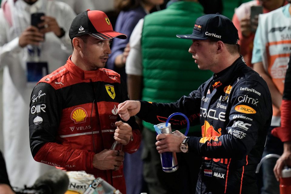 Ferrari driver Charles Leclerc of Monaco, left, speaks to Red Bull driver Max Verstappen of the Netherlands after the Formula One Grand Prix it in Jiddah, Saudi Arabia. Credit: AP