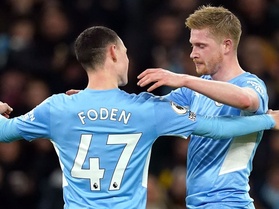 Manchester City’s Kevin De Bruyne, right, and Phil Foden have scooped the Premier League’s player of the year awards (Martin Rickett/PA)