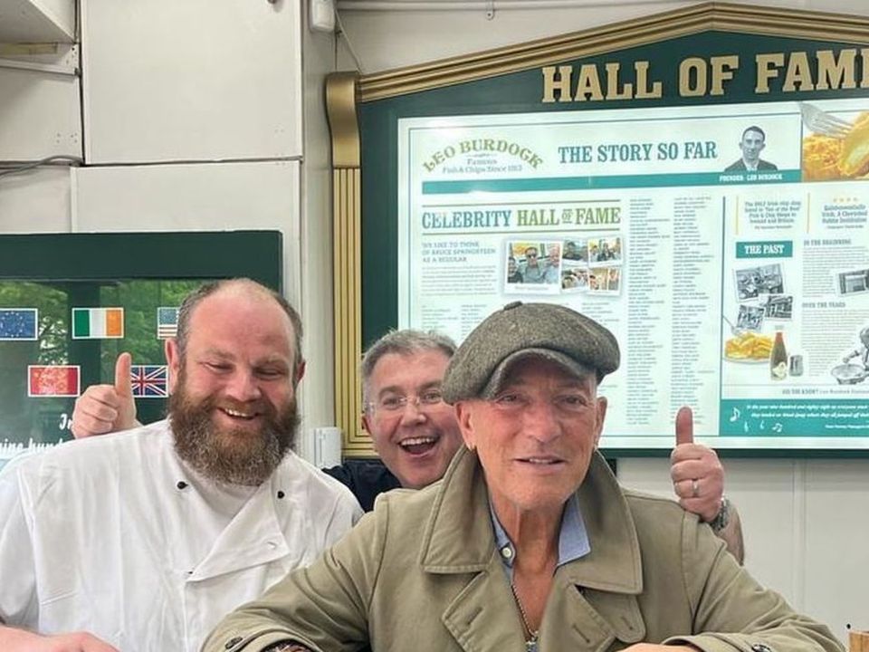 On Saturday, Bruce Springsteen kept up his tradition of dropping into Leo Burdock's in Dublin, posing for photos with staff and signing a copy of his new album. Photo: Leo Burdock Ireland