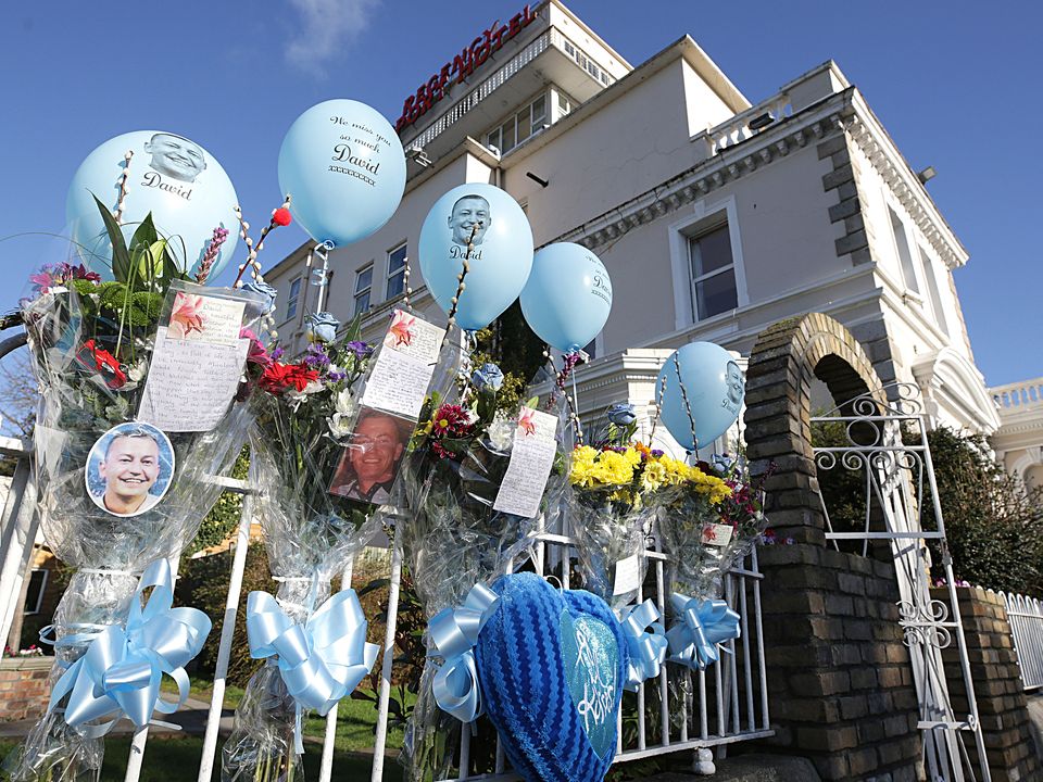 Flowers and balloons at the Regency after David Byrne’s murder