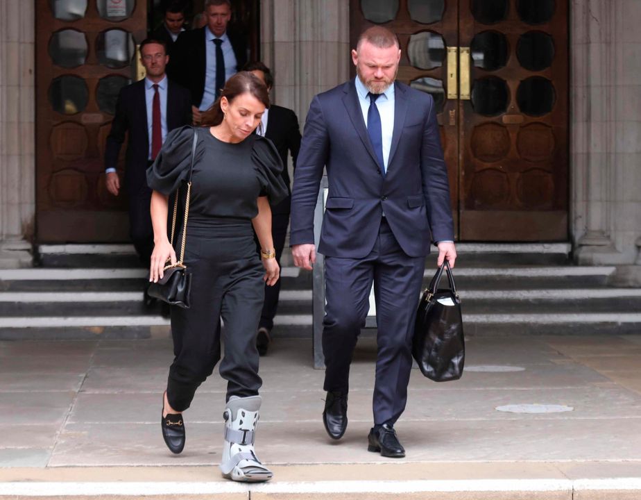 Coleen and Wayne Rooney leave the Royal Courts Of Justice, London, during high-profile libel battle between Rebekah Vardy and Coleen Rooney. Picture date: Thursday May 12, 2022. PA Photo.