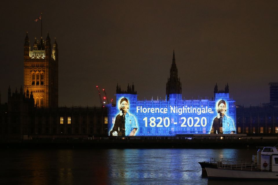 Florence Nightingale is projected on the Houses of Parliament in Westminster, London, on International Nurses Day (Jonathan Brady/PA)