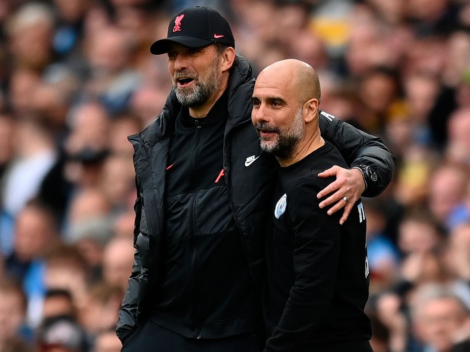 Pep Guardiola with Jurgen Klopp at Etihad Stadium on April 10, 2022 in Manchester, England. (Photo by Michael Regan/Getty Images)