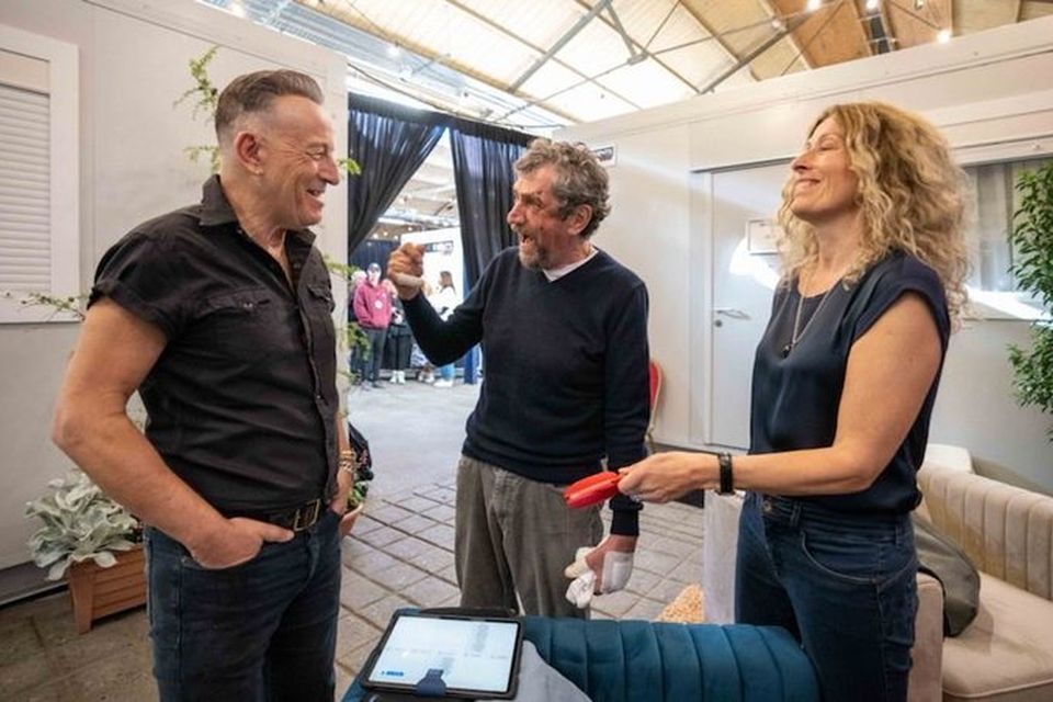 Charlie Bird and his wife Claire Mould meet Bruce Springsteen backstage at the RDS, Dublin, on Friday. Photo: Twitter