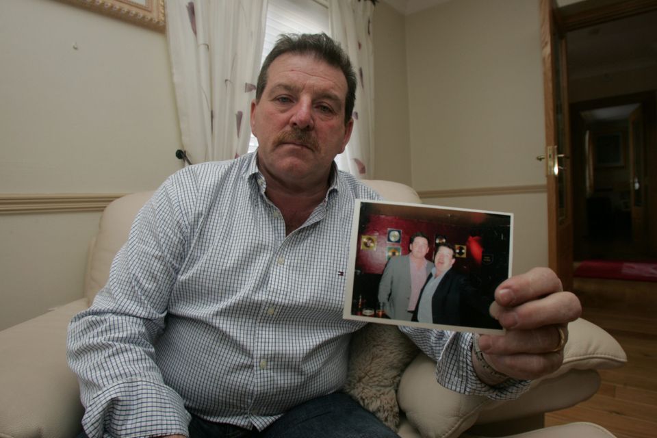 Stephen Collins, the father of Roy Collins, who was shot dead in Limerick pictured with a photograph of him Pic. Brian Arthur/ Press 22