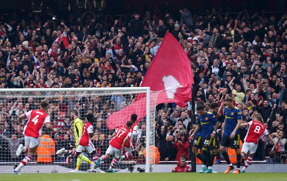 Arsenal eased past Manchester United on Saturday (John Walton/PA)