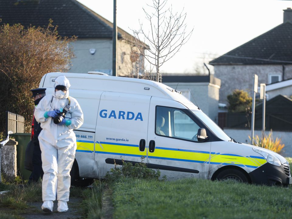 Garda Forensics investigating the scene of a fatal assault on a man in Collins Place, Finglas, Dublin 11. Photograph:  Leah Farrell / RollingNews.ie