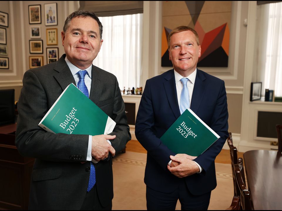 Minister for Finance Paschal Donohoe and Minister for Public Expenditure and Reform Michael McGrath with Budget 2023 at the Department of Finance.
