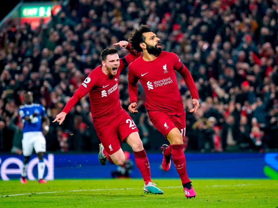 Liverpool's Mohamed Salah (right) celebrates scoring their side's first goal of the game