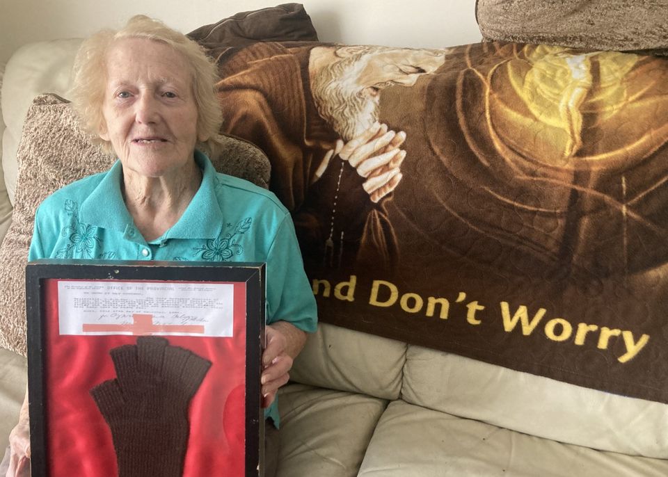 Nelly Cosgrave (92), from Ballybrown, Co Limerick, photographed here holding a glove with alleged healing powers that was worn by the late Italian saint, Padre Pio. Ms Cosgrave is one of two women who said they believe they saw an apparition of St Padre Pio, at St Saviour’s Church, Limerick Dominicans, during a mass last Friday which marked the 52nd anniversary of St Pio’s death. Photo Brendan Gleeson