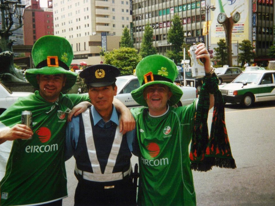 Tony Considine with a Japanese traffic cop before Ireland's group game with Saudi Arabia