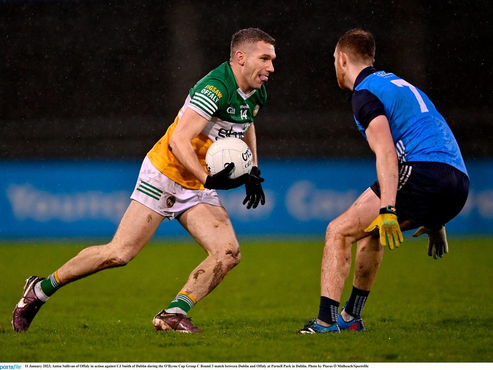 Anton Sullivan of Offaly in action against CJ Smith of Dublin during the O'Byrne Cup Group C Round 3 match at Parnell Park. Photo: Piaras Ó Mídheach/Sportsfile