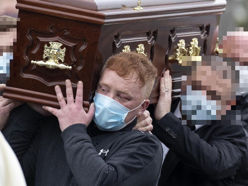 Mr Doyle's remains are carried from church after funeral mass by family members including nephew Declan Haughney this morning. Picture Colin Keegan, Collins Dublin