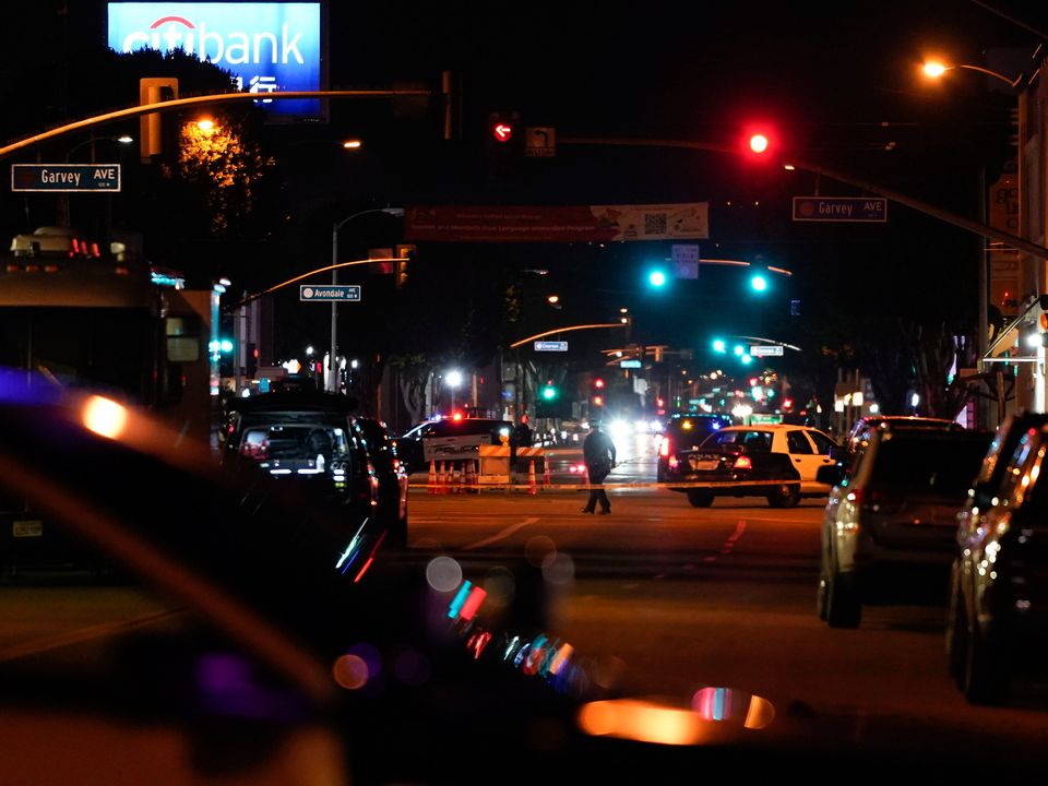 Police investigate a scene where a shooting took place in Monterey Park, California. (AP Photo/Jae C. Hong)