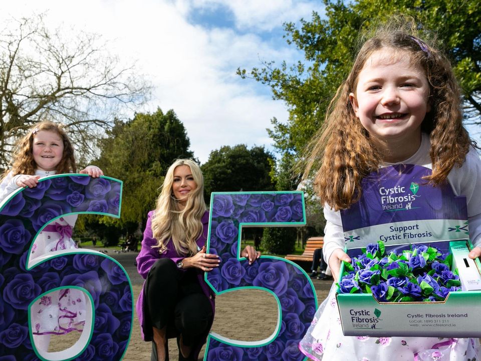 Rosanna Davison with sisters Caoimhe ui Luing, aged 8, and Fiadh, aged 6, backing 65 Roses Day
