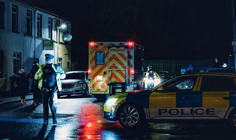 Police at the scene of the murder of Shane Whitla in Lurgan last month: Picture by Kevin Scott
