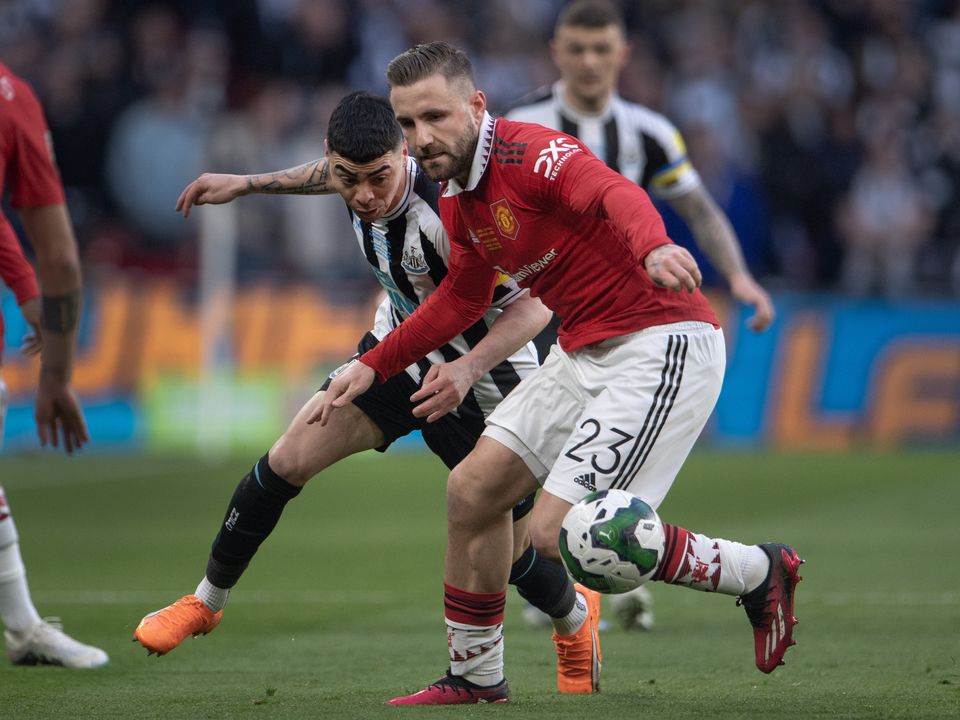 Miguel Almiron of Newcastle United and Luke Shaw of Manchester United in action during the Carabao Cup Final. Photo: Visionhaus/Getty Images