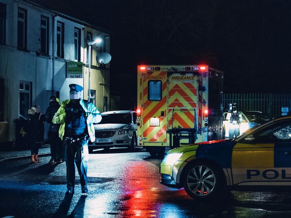 Police at the scene of the murder of Shane Whitla in Lurgan last month: Picture by Kevin Scott