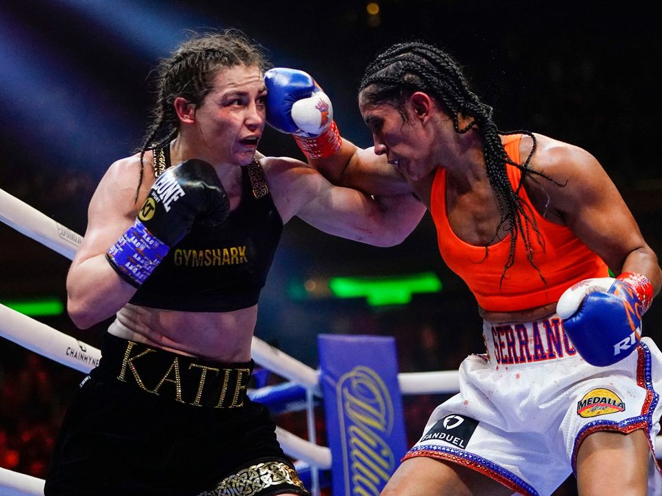 Amanda Serrano, right, punches Ireland's Katie Taylor during the eighth round of a world lightweight championship at Madison Square Garden in New York last Saturday