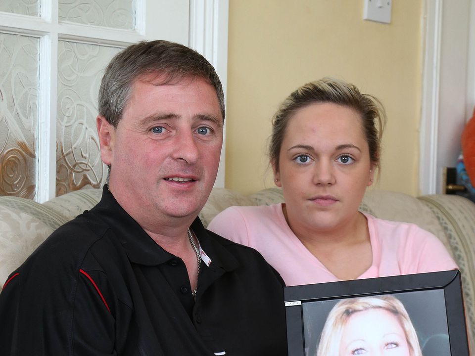 Andrew Furlong and sister Andrea with a photo of Nicola. Photo: Patrick Browne