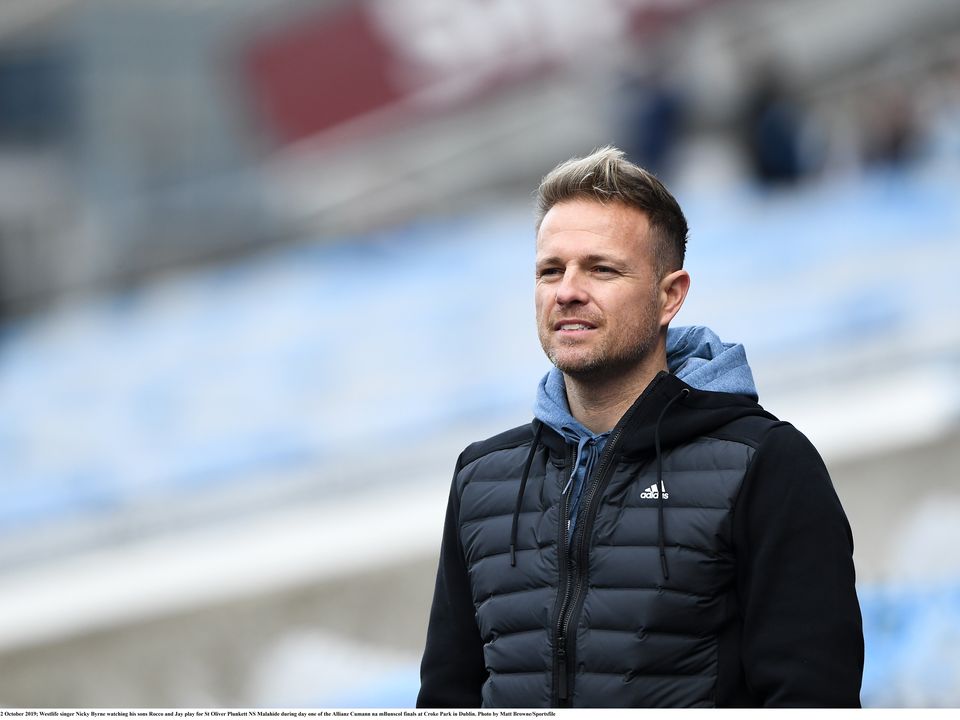 22 October 2019; Westlife singer Nicky Byrne watching his sons Rocco and Jay play for St Oliver Plunkett NS Malahide during day one of the Allianz Cumann na mBunscol finals at Croke Park in Dublin. Photo by Matt Browne/Sportsfile 