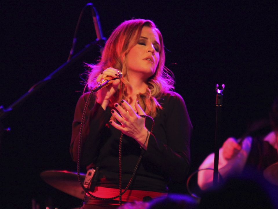 FILE - Lisa Marie Presley performs during her Storm & Grace tour on June 20, 2012, at the Bottom Lounge in Chicago. Presley â€” the only child of Elvis Presley and a singer herself â€” was hospitalized Thursday, Jan. 12, 2023, her mother said in a statement. (Photo by Barry Brecheisen/Invision/AP, File)