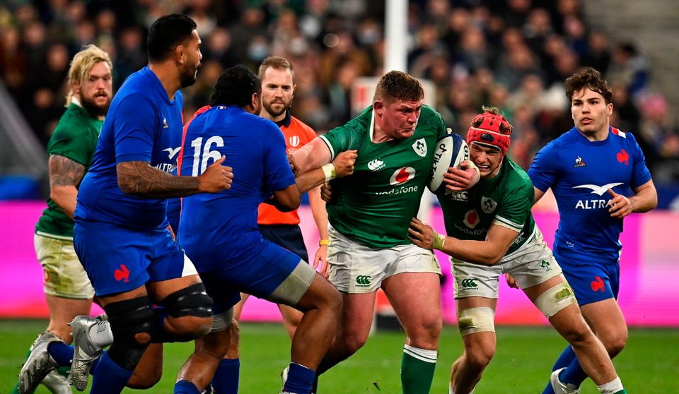 Tadhg Furlong of Ireland is tackled by Peato Mauvaka of France