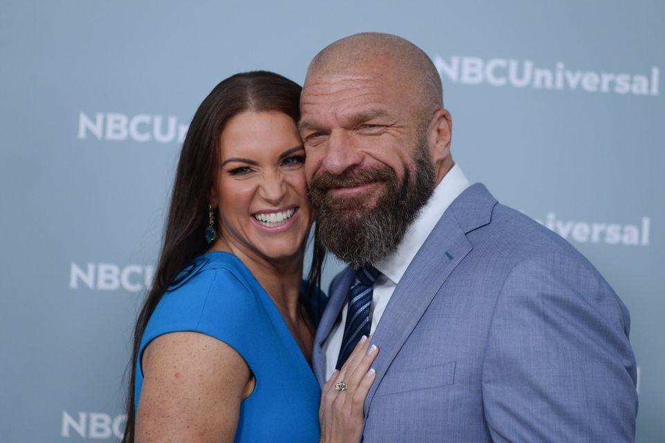 Stephanie McMahon with wrestler Triple H (Alamy/PA)