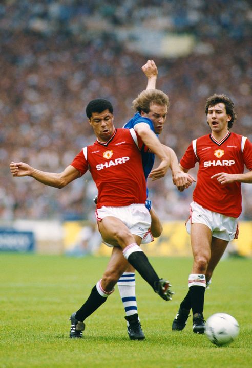 LONDON, UNITED KINGDOM - MAY 18:  Everton striker Andy Gray (c) is challenged by Paul McGrath (l) as Bryan Robson looks on during the 1985 FA Cup Final between Everton and Manchester United at Wembley Stadium on May 18, 1985 in London, England. (Photo by David Cannon/Allsport/Getty Images)