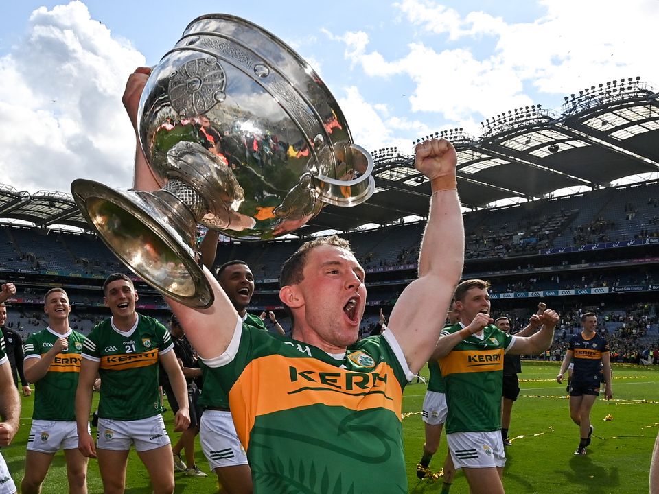 Tadhg Morley of Kerry celebrates with the Sam Maguire trophy this year