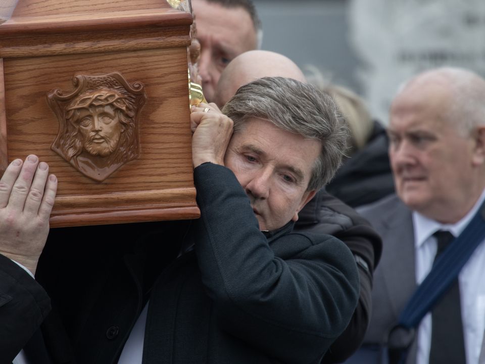 Daniel O'Donnell carries his sister's coffin. Photo: NW Newspix