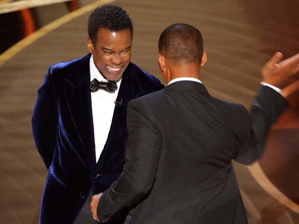 Will Smith hits Chris Rock on stage. Photo: Brian Snyder/Reuters