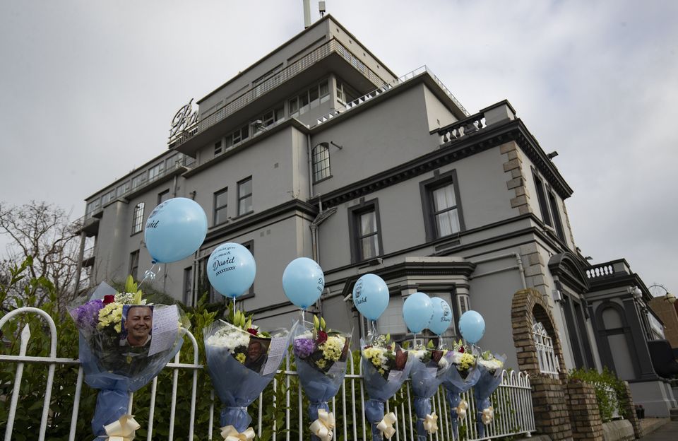 Balloons, flowers, photos and messages were previously left at the site of the former Regency Hotel in Dublin (Brian Lawless/PA)